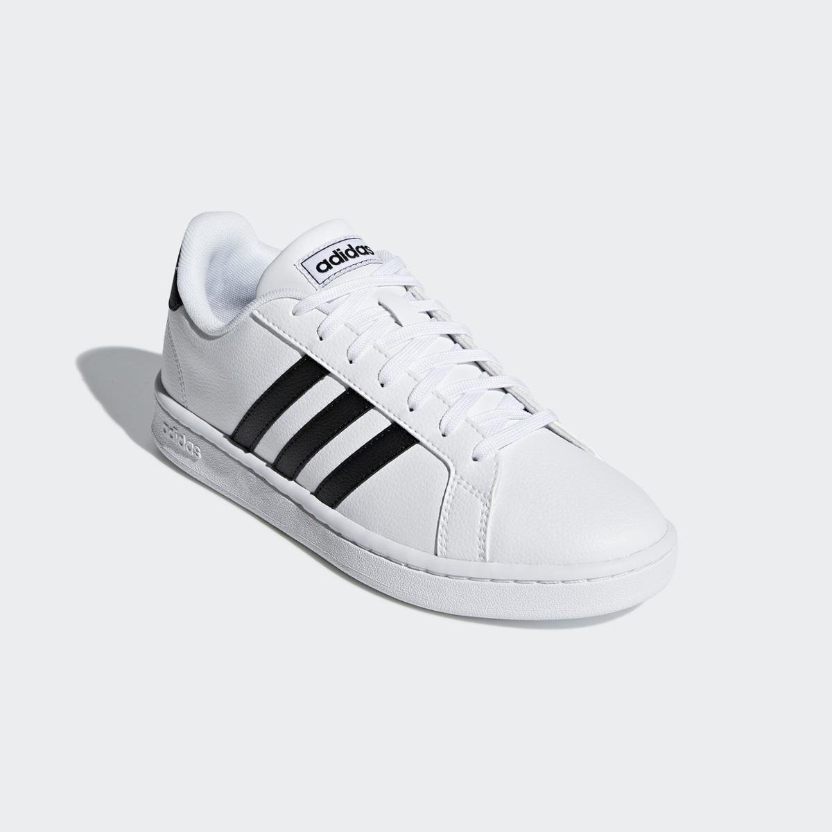 tenis adidas preto com listra branca