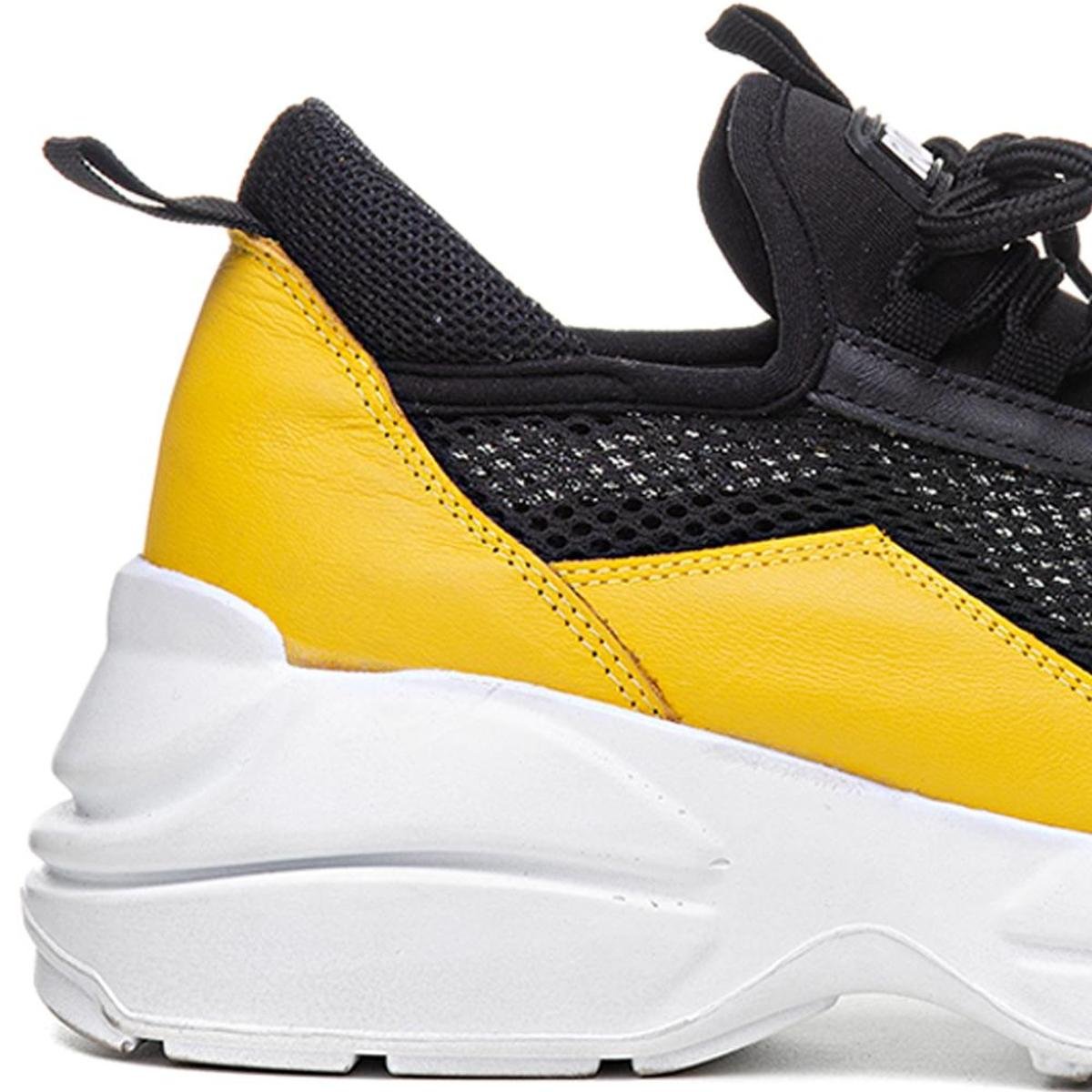 tenis preto e amarelo feminino