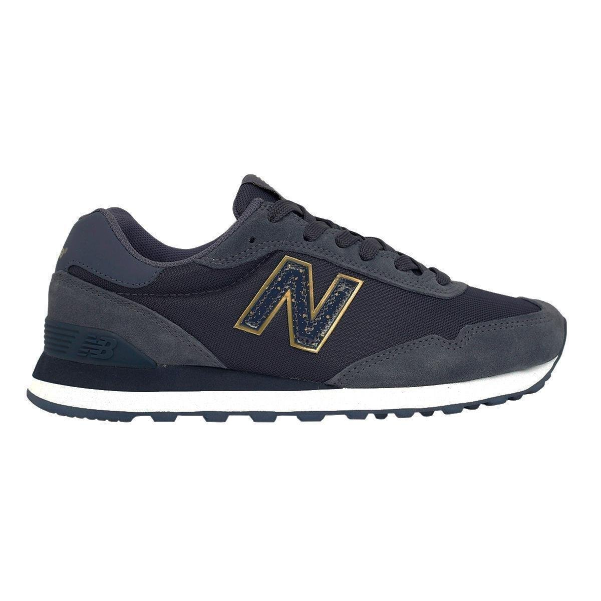 new balance preto com dourado